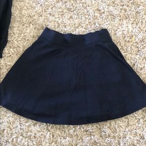 Navy Blue uniform skirt with built in shorts.